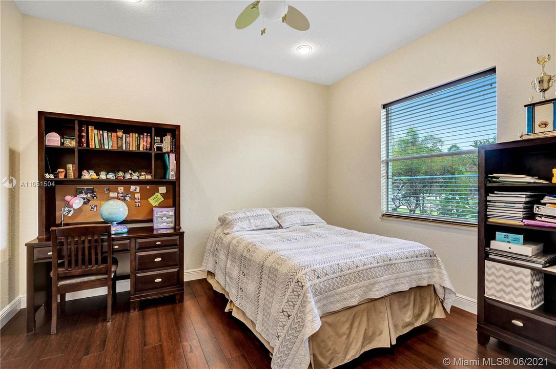 Guest bedroom with lovely bamboo flooring