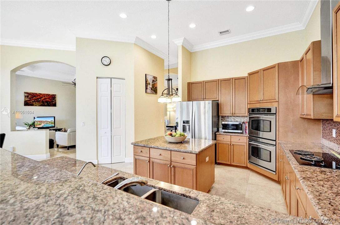 Amazing gourmet kitchen with ample views to the living and dinning area