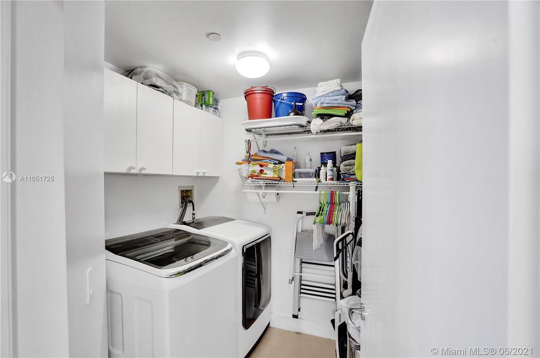 Upgraded washer and drier and spacious laundry room.