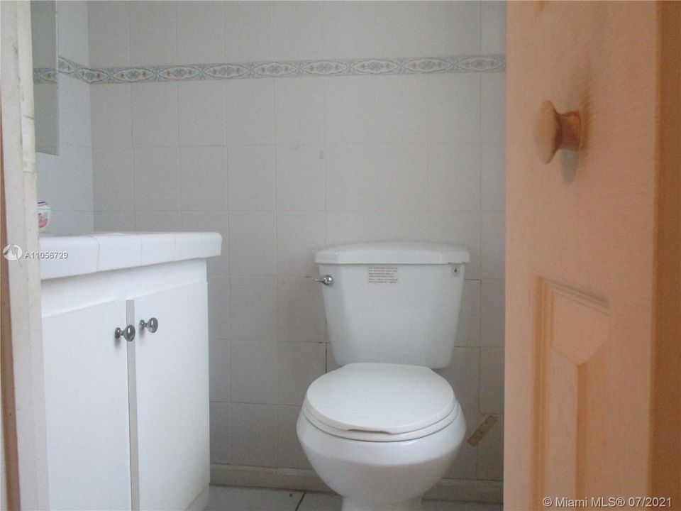 Master half bathroom off bedroom