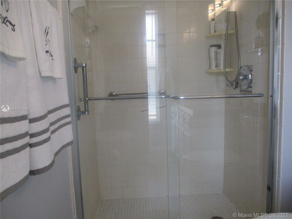 Master bathroom with walk in shower & glass sliders