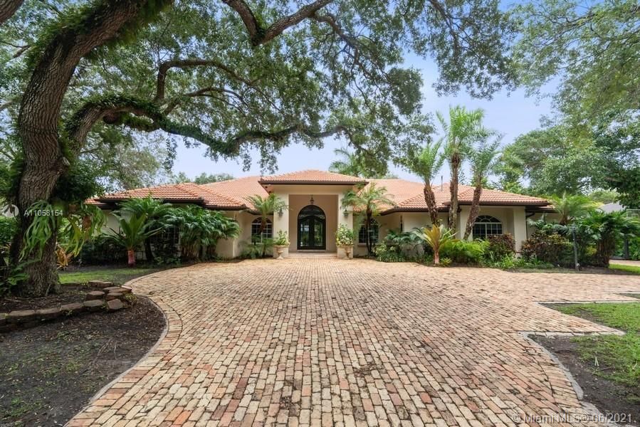 Chicago brick pavers cover all of large and ample driveway.