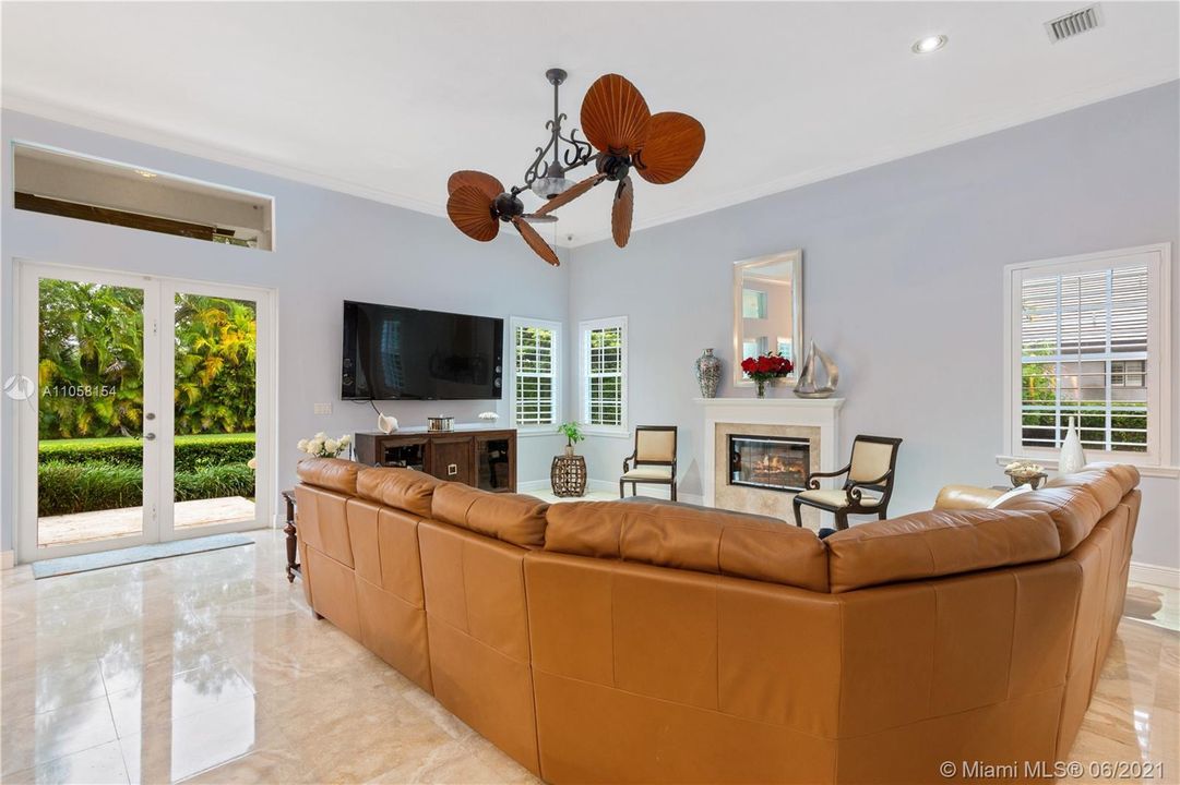 Family room offers plenty of natural light and plenty of space.