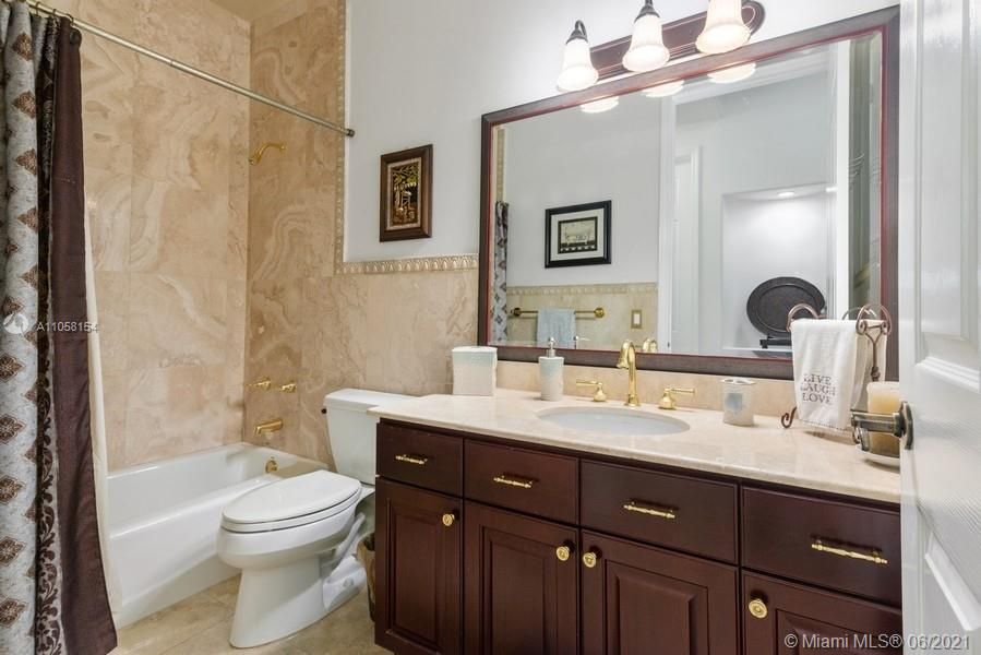 Guest bathroom by family room and formal dining room.