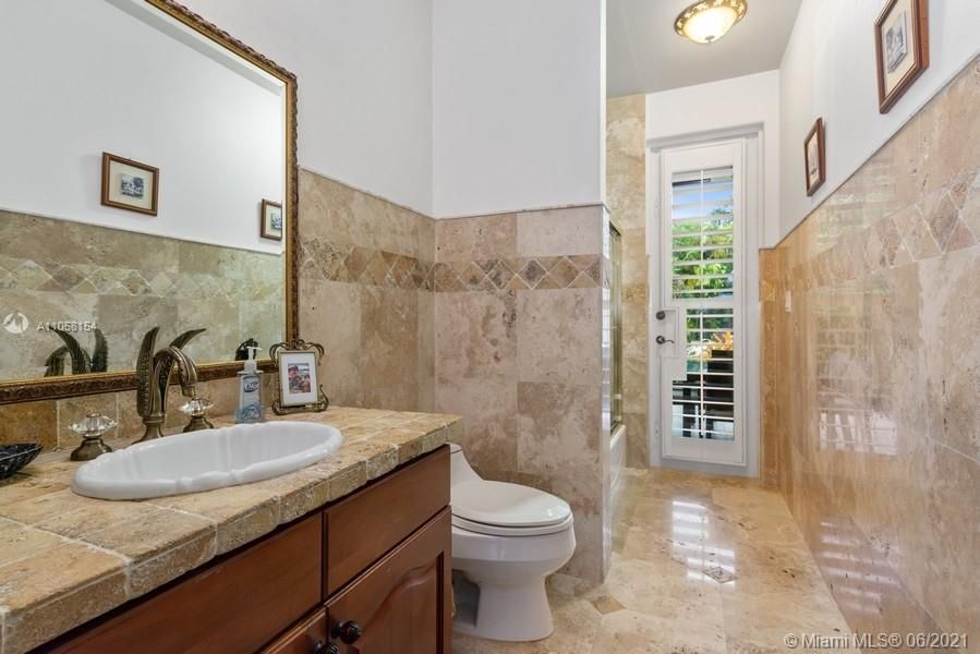 Cabana bathroom or guest bathroom adjacent to formal living room.