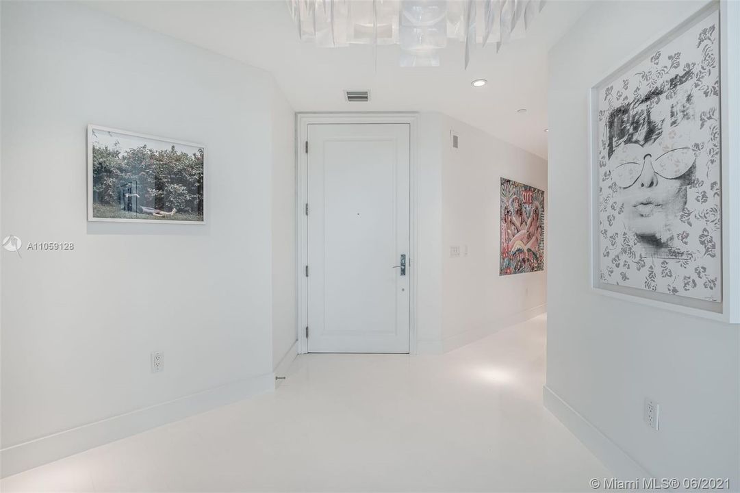 Private elevator leads you to this splendid residence where the contemporary artsy style resonates throughout.