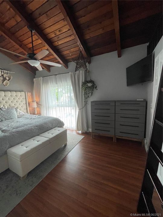 Spacious Master Bedroom with Walk-in Closet and a small loft above it