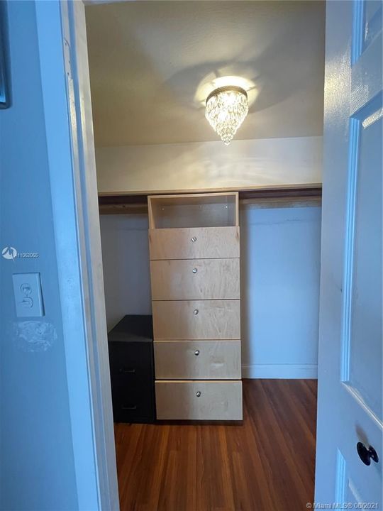 Master Bedroom Walk-in closet with built-ins