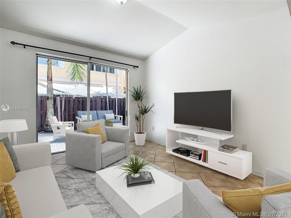 Modern vaulted ceiling living room relies on a lot of natural light with lighter floors to help make the space feel as large and airy as possible. (“Virtual Staging”)