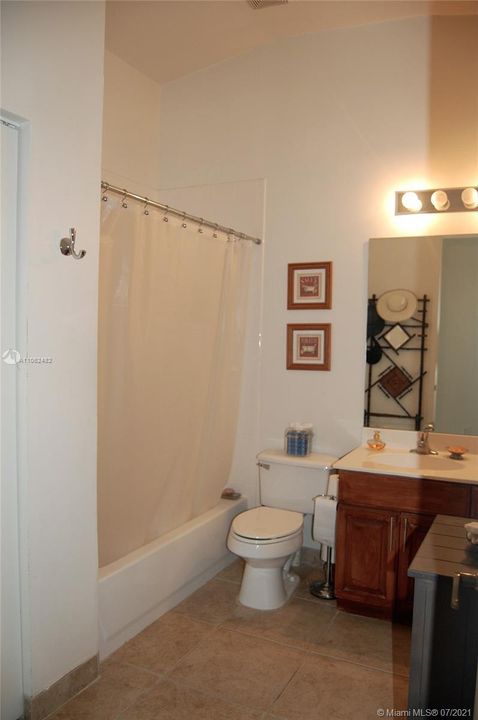 Full bathroom with linen closet