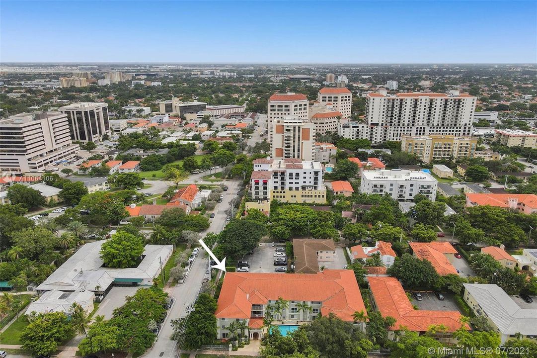 Ideally situated on a tree-lined street just minutes from downtown Coral Gables & Miracle Mile