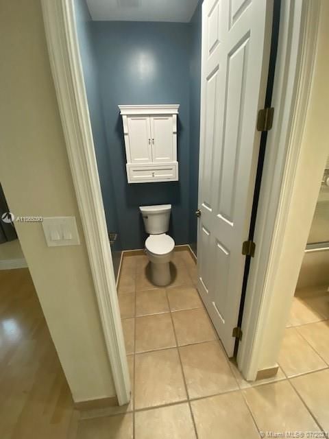 PRIVATE MASTER BATHROOM TOILET AREA.