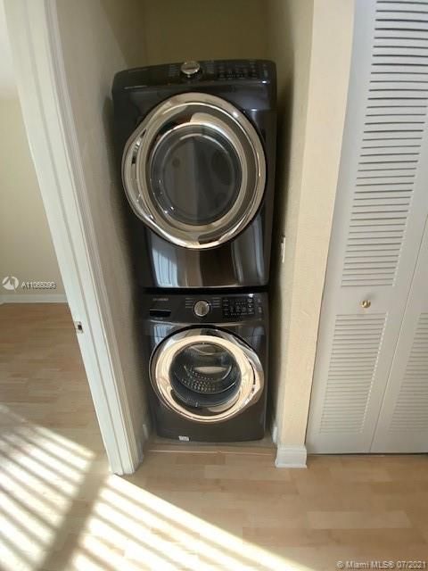 FULL SIZE WASHER DRYER UPSTAIRS HALLWAY.