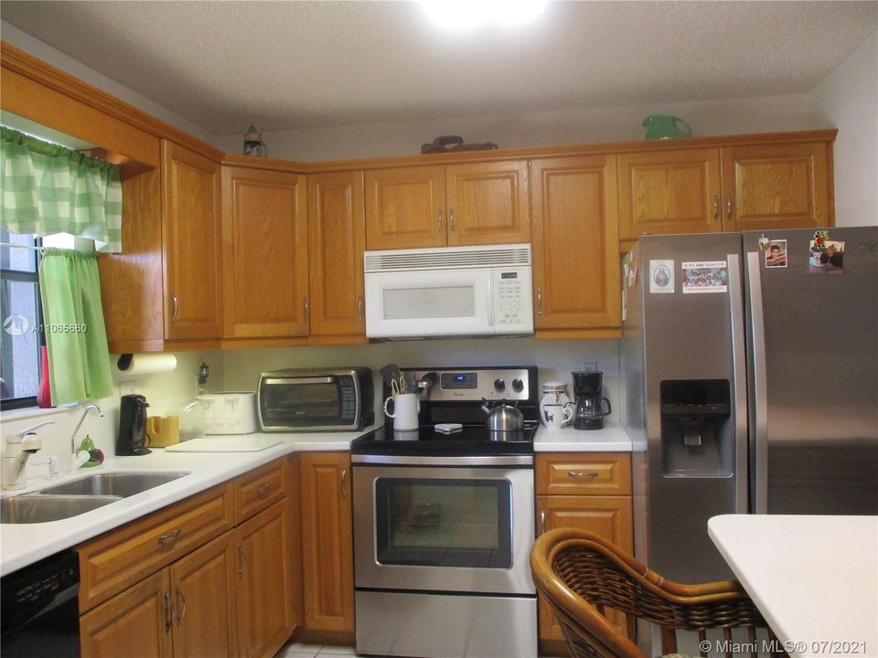 Kitchen with Maple colored cabinets