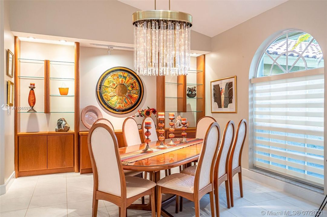 Spacious dining room complete with custom built in