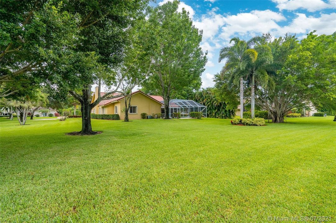 Beautifully manicured lot complete with electric fence to allow your pets to roam this spacious property.