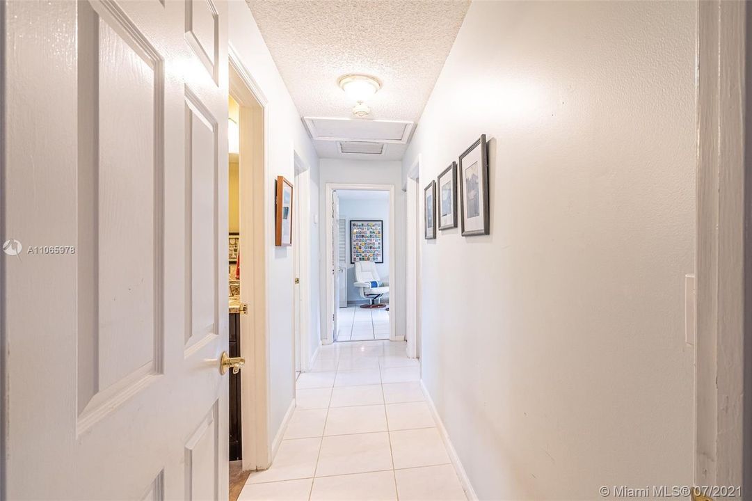 Hallway to kids wing with 3 bedrooms & full cabana bath