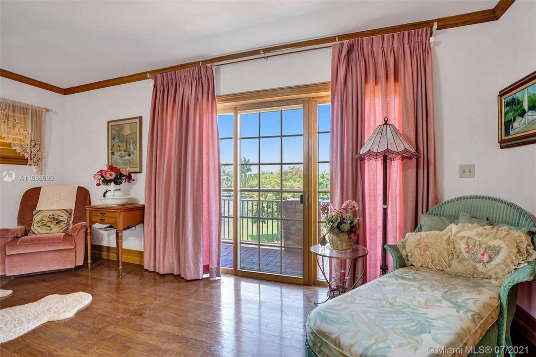 Master bedroom has access to the balcony overlooking the waterway