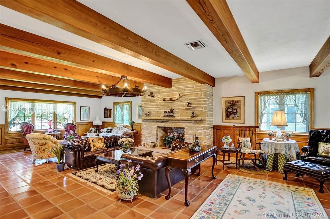 Wood burning Fireplace and huge wood beams in the main living area