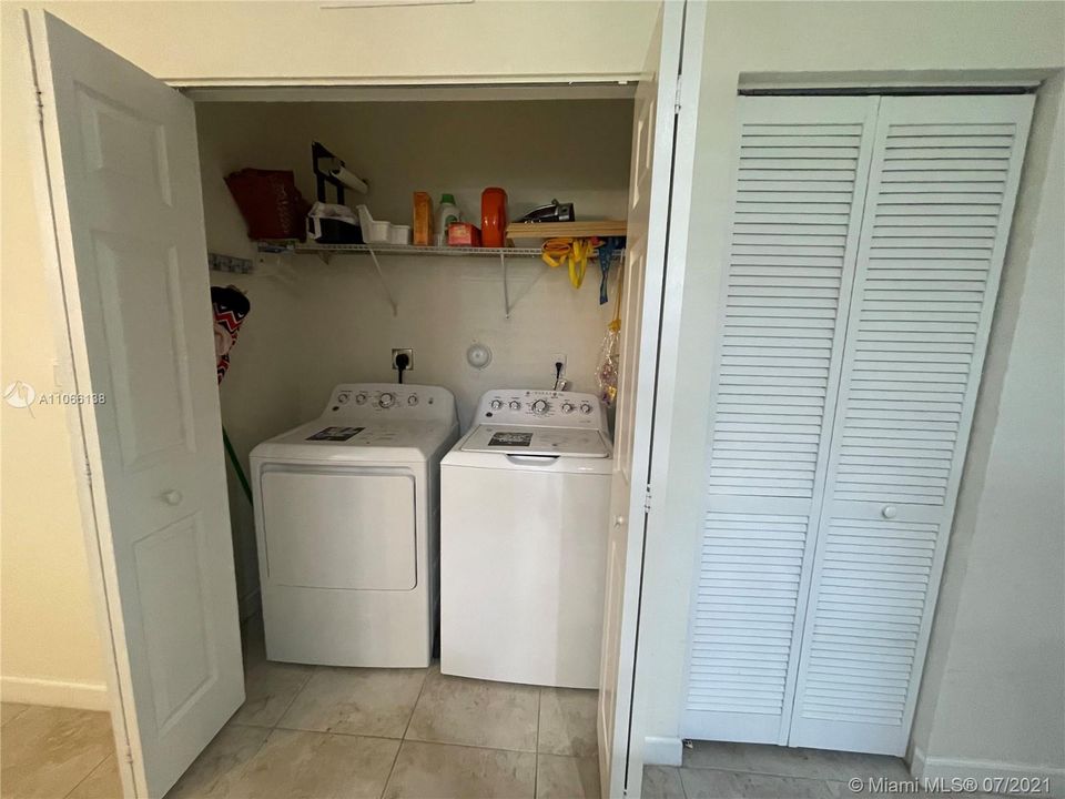WASHER AND DRYER/ A/C CLOSET