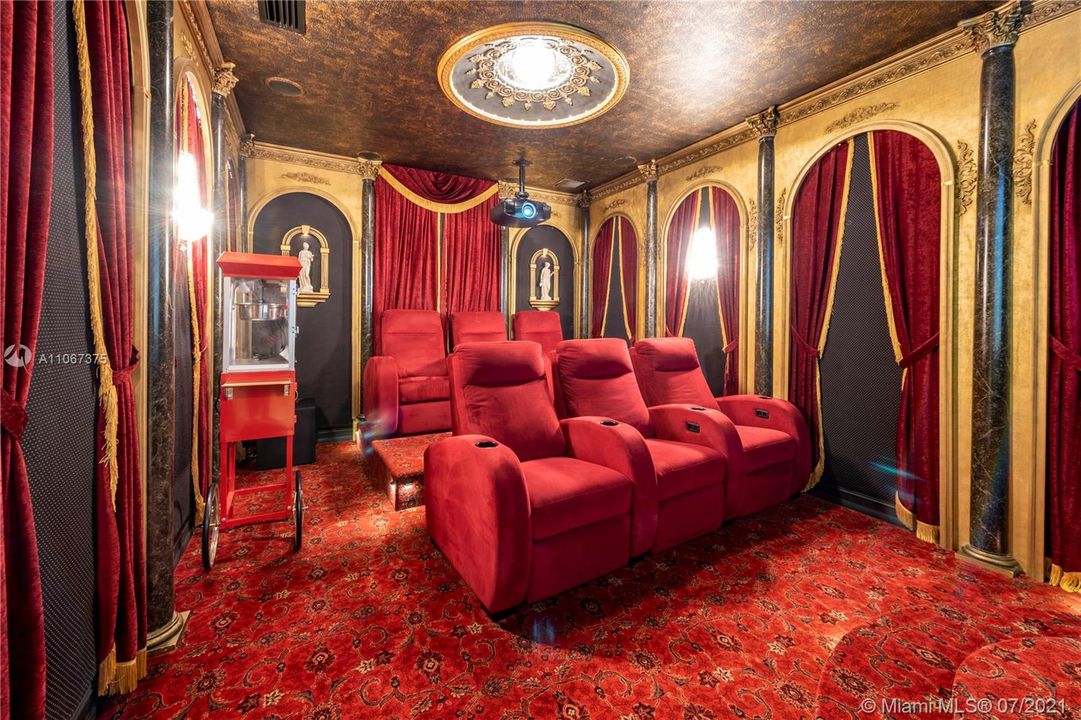 Professionally designed and furnished Theater room with optic lighting, 6 electric reclining seats, and full surround sound system (bedroom #6)
