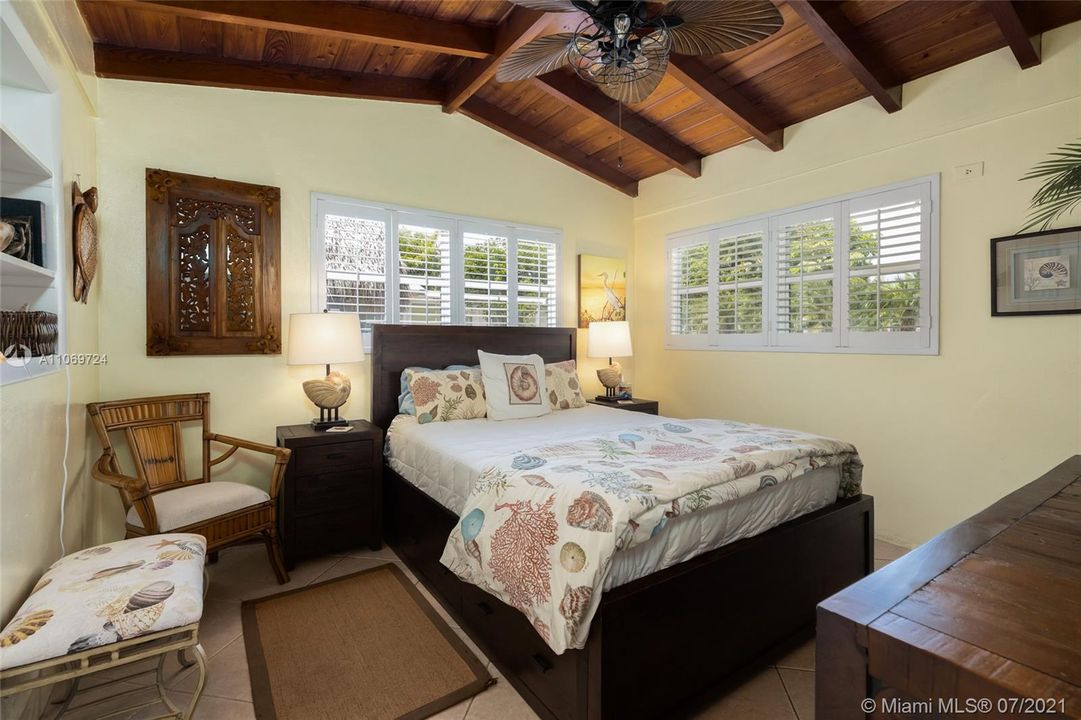 2nd BedroomEach of the bedrooms in the Main House  enjoys stunning richly colored, exposed wood beamed ceilings
