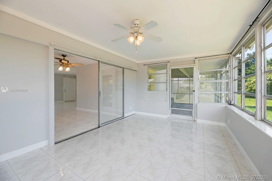 Sun-filled Florida Room connecting to Screened Porch