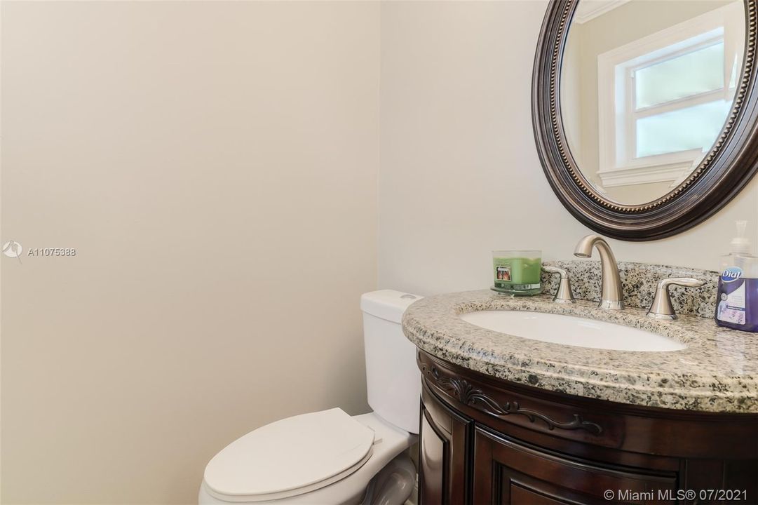 This is the powder room located near the front door.