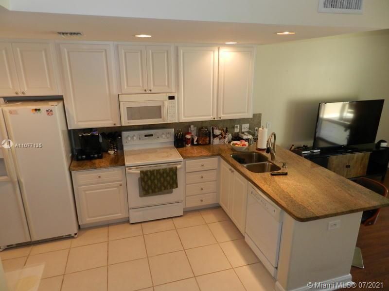 Kitchen has stainless steel appliances