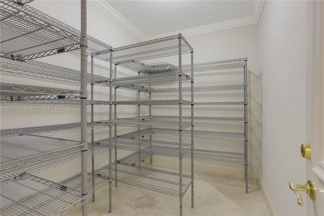 Huge pantry and severs as a safe room constructed with concrete