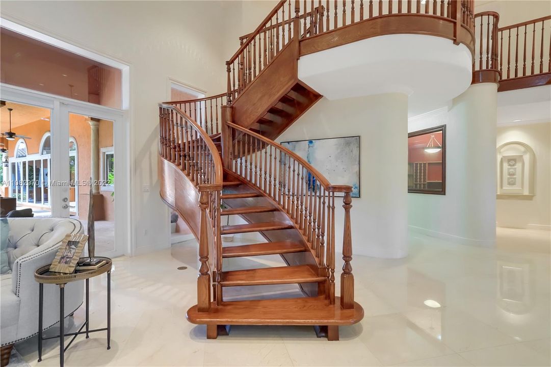 Winding wood staircase to 2nd floor