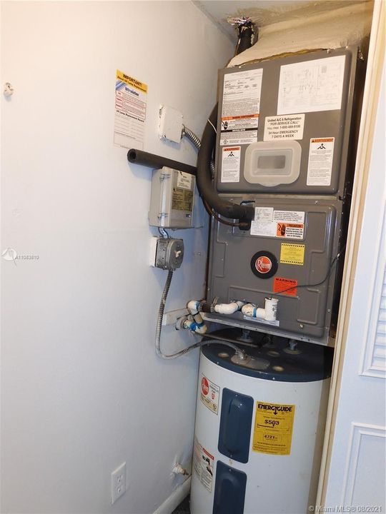 AC & Water Heater in Hall Closet