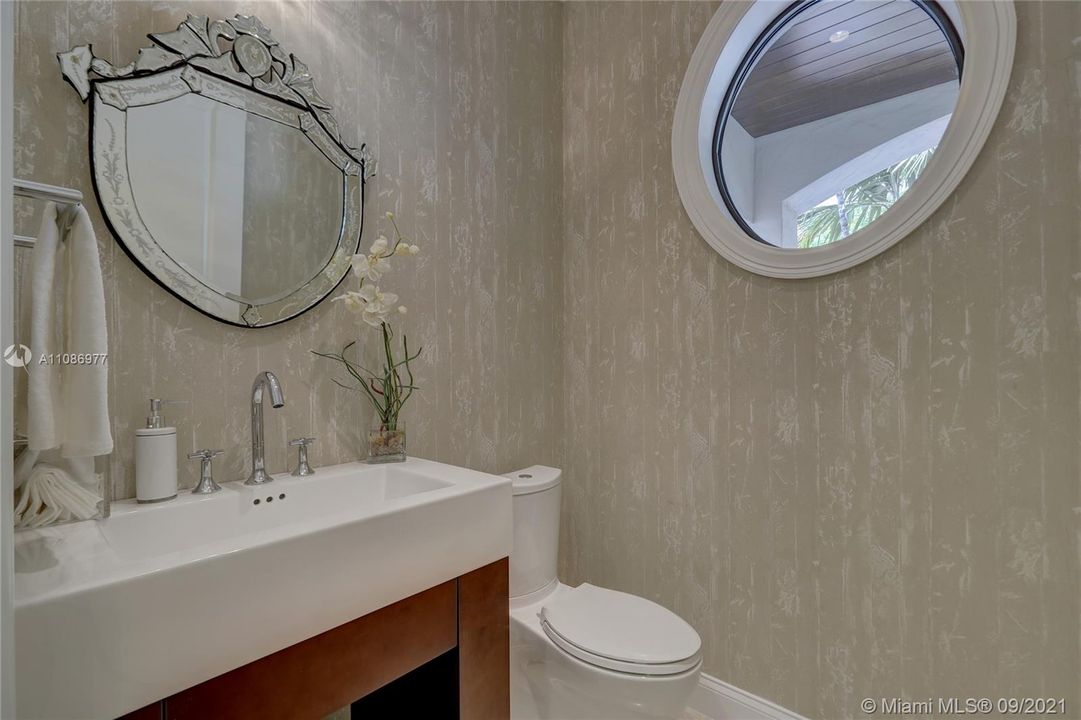 Powder Room Downstairs - Mirror Excluded. Beautiful wall coverings