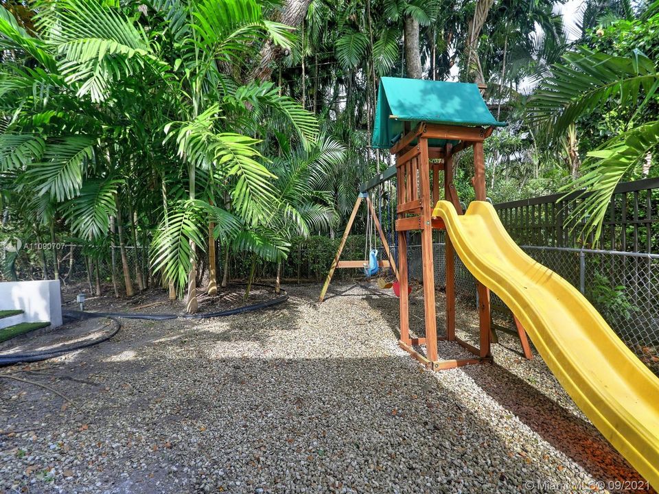 children's playground area in back yard