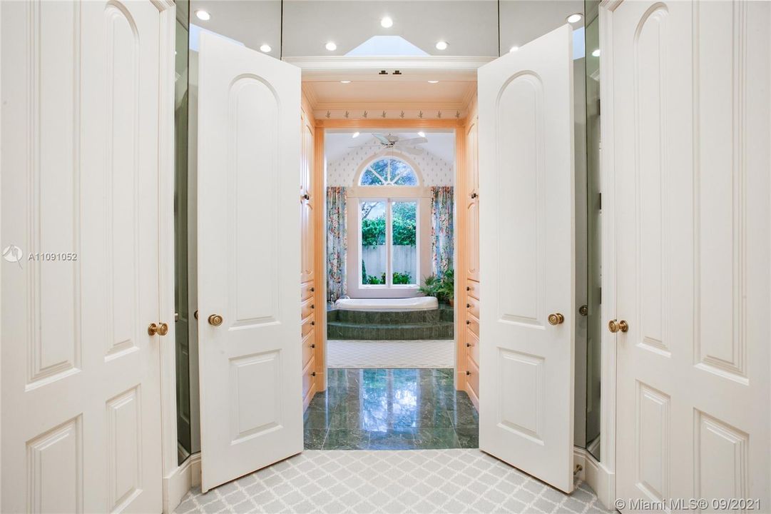 Entry to Master bath with 2 walk in closets