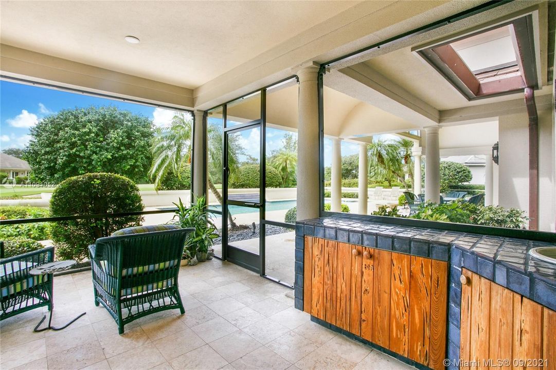 Screened in porch with wet bar