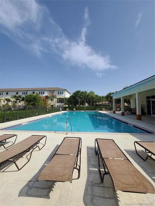 community pool to relax, grab some sun & fun