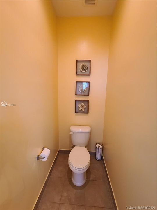 master bathroom enclosed toilet
