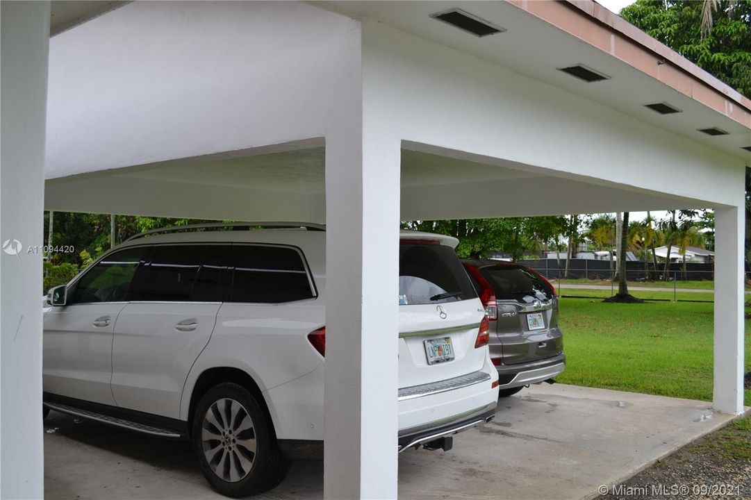 Two covered parking in the front of the house.