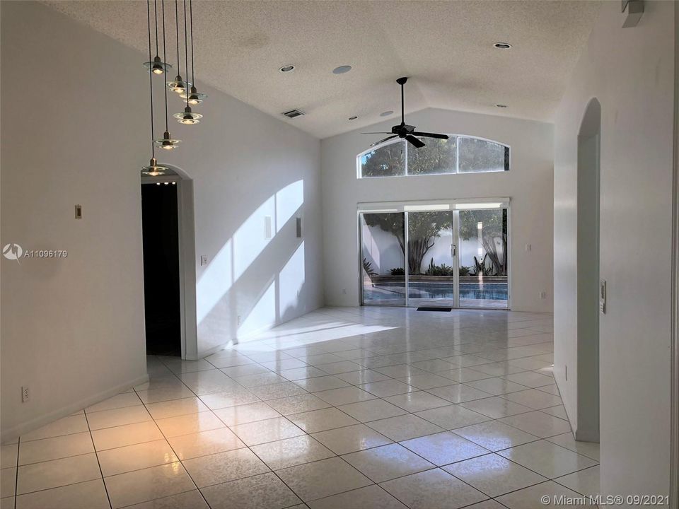 From the front door you see straight out towards the pool.  Notice the high ceilings.