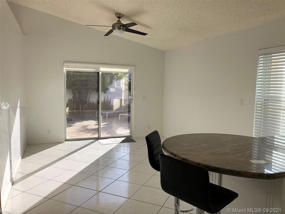 The kitchen counter has room for informal meals.