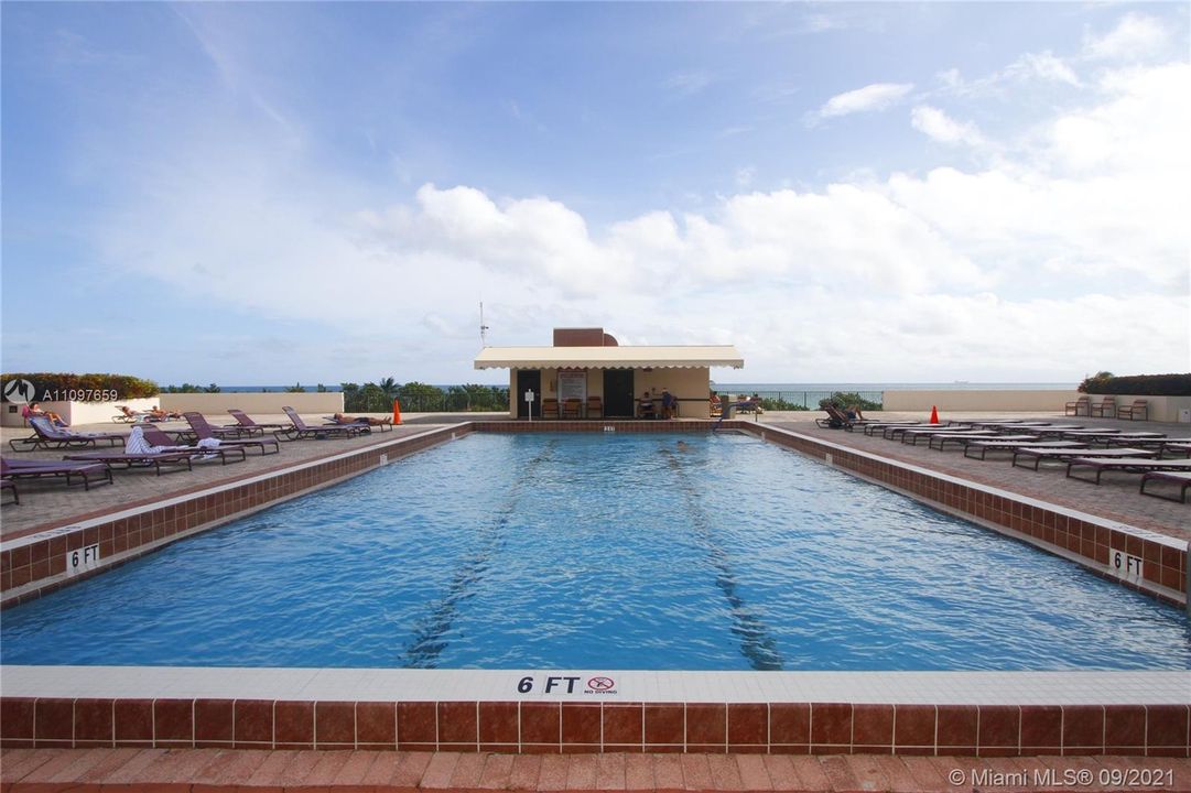 ONE OF 2 OLYMPIC SIZED HEATED POOLS-