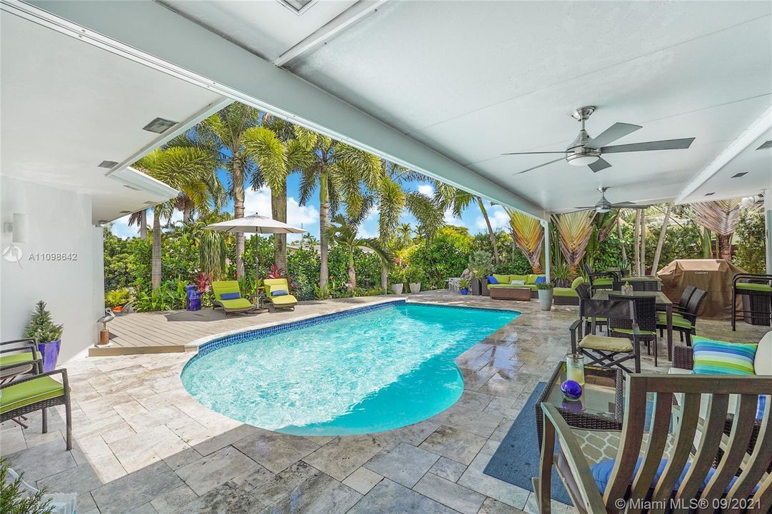 Private backyard with solar heated salt water pool