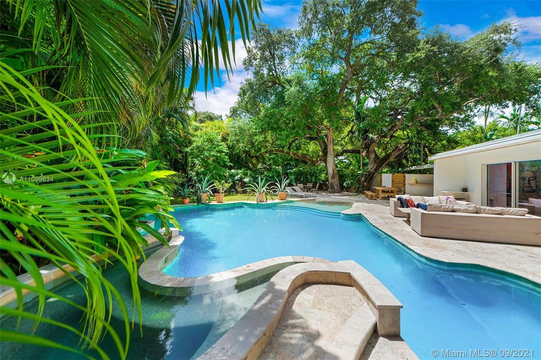 Lagoon style jacuzzi flows beautifully into your salt water system pool.