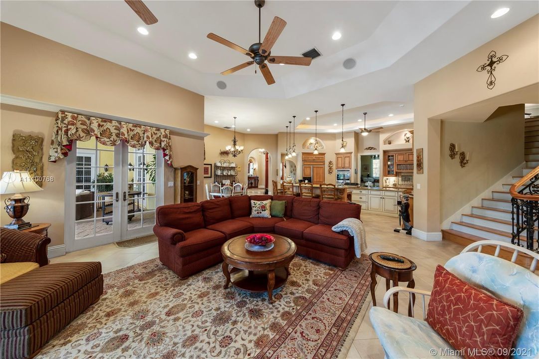 FAMILY WITH STAIRWELL TO GAME ROOM