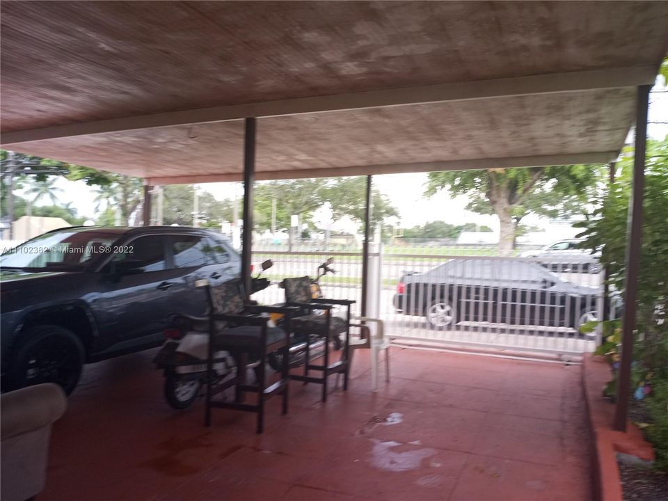 covered parking area front of garage