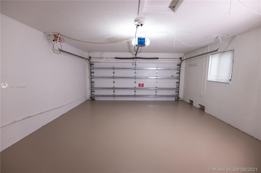 2 CAR GARAGE WITH HIGH IMPACT DOOR