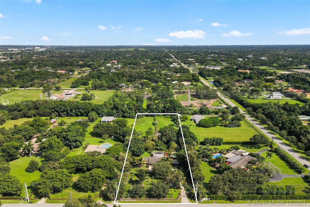 Lot is 2.36 acres, about a mile off Sheridan Street, surrounded by Nature