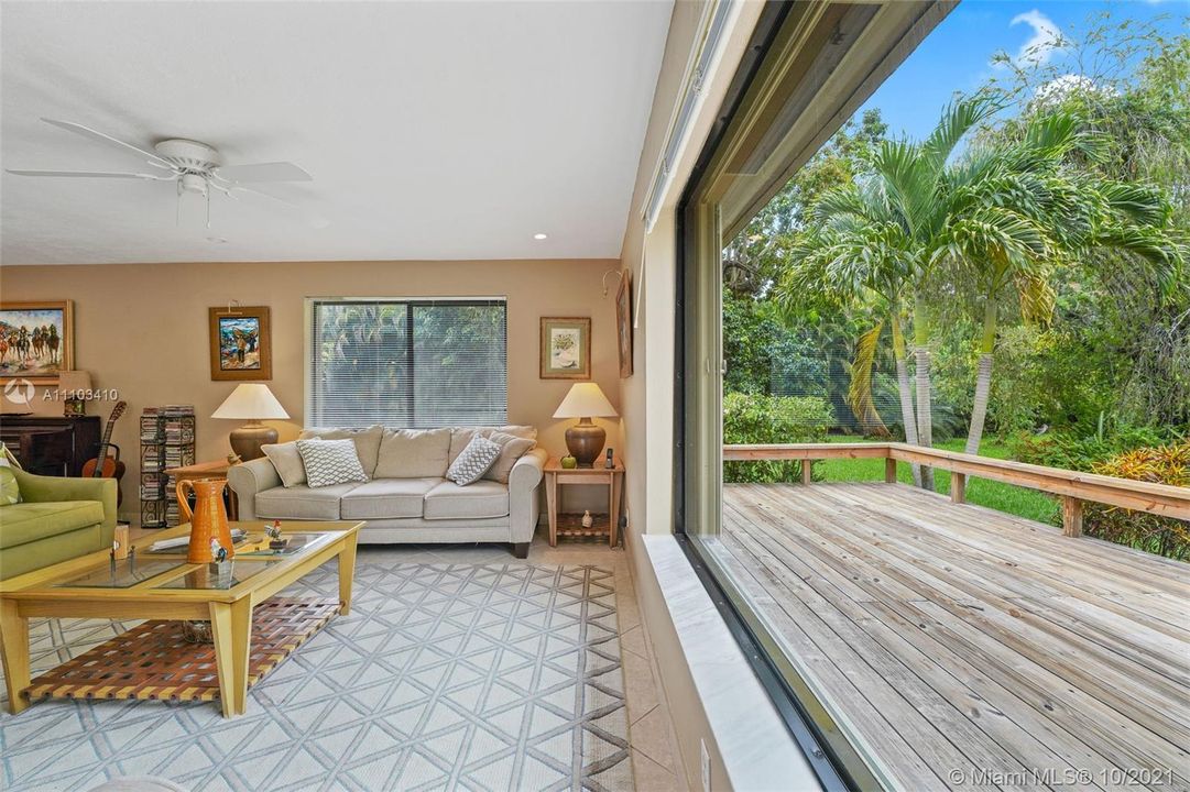 Expansive Family room, with large windows to relax and enjoy the view