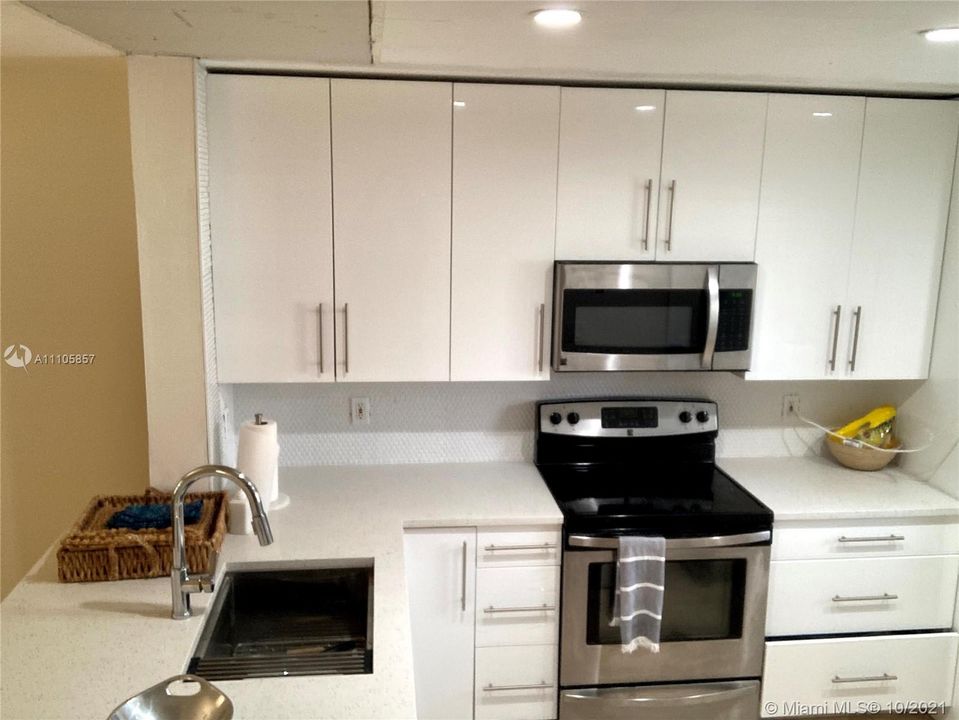 New kitchen with deep sink and panel ready dishwasher